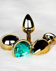 Shots Ouch! Round Gem Butt Plug Large - Gold/Emerald Green